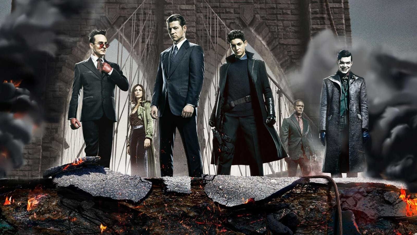 5 villains from Gotham stood in a smoky landscape